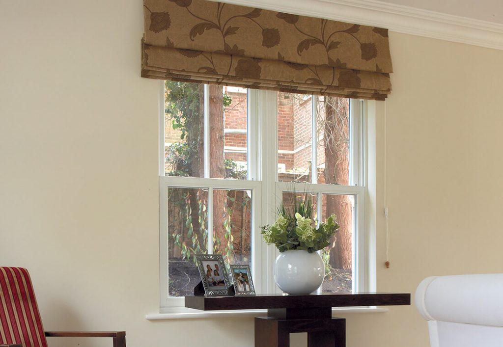 Dual white uPVC vertical sliders