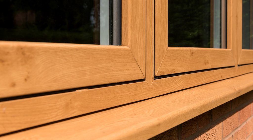 Light oak effect flush sash window close up