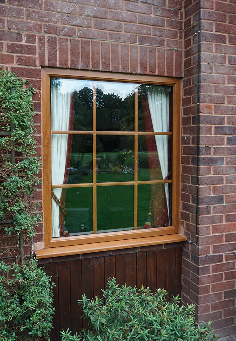 Oak effect uPVC window with astragal bars