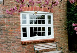 White uPVC casement window with astragal bars