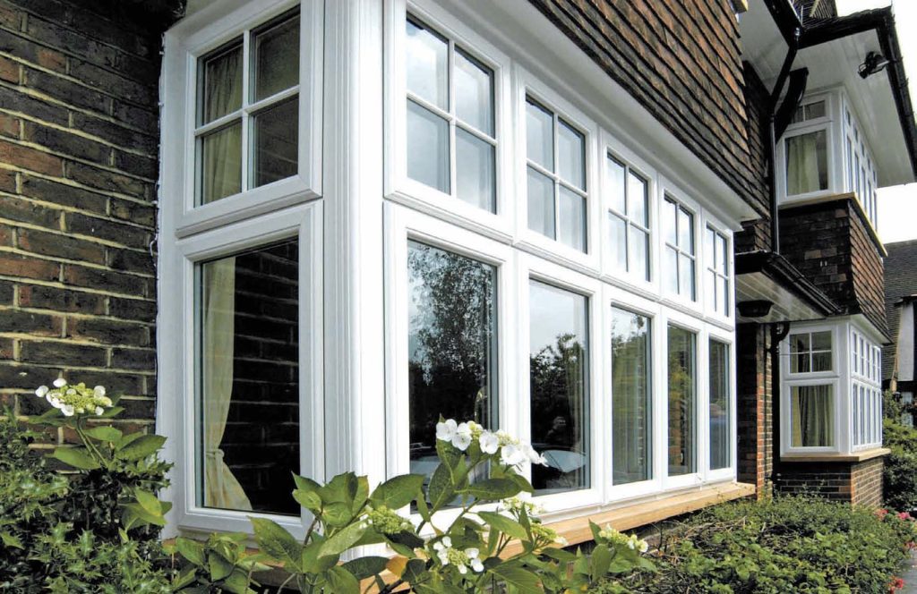 White uPVC casement window with astragal bars