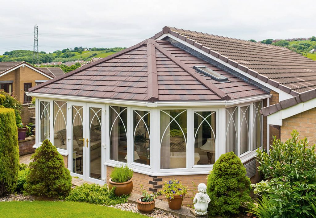 uPVC Victorian conservatory with a red tiled roof