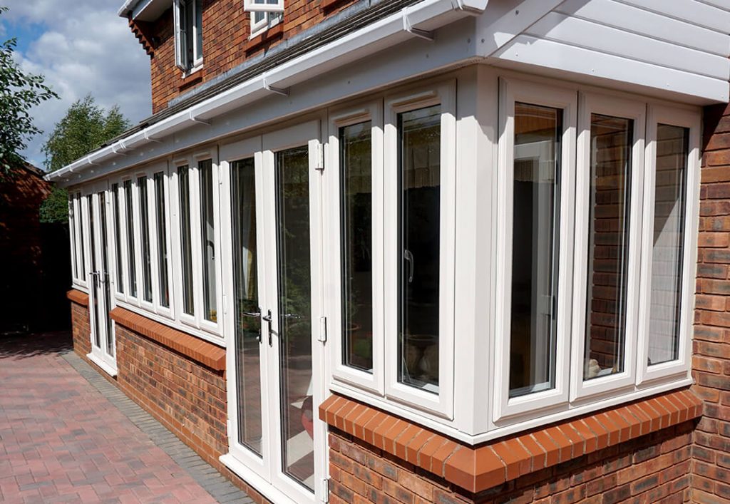 Row of white uPVC casement windows