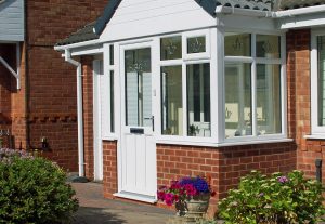 White uPVC entrance door and porch