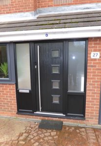 Black uPVC porch with a black Solidor composite door