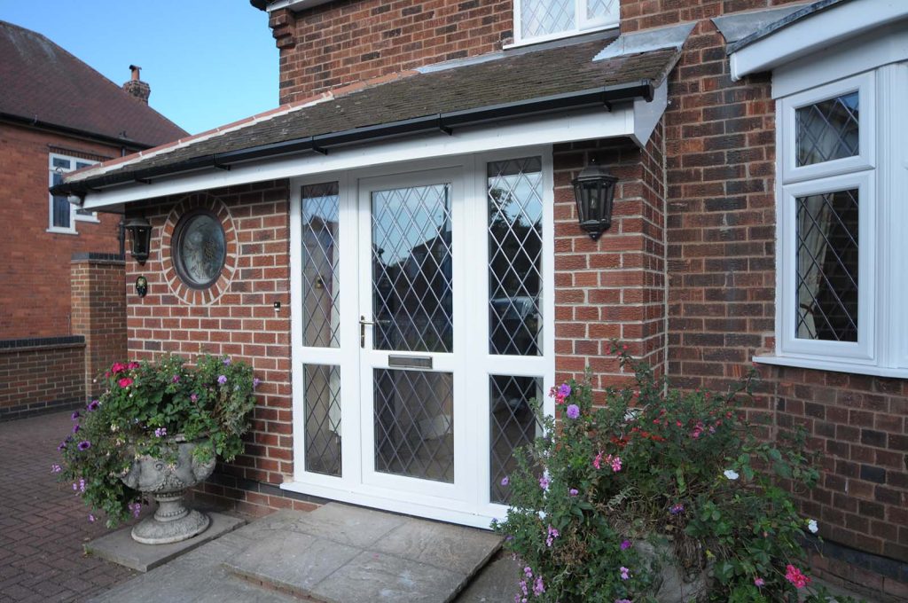 White uPVC entrance door and porch