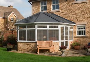 uPVC Victorian conservatory with a tiled roof