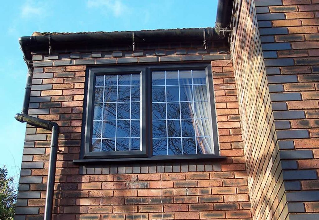 Black uPVC casement window installation