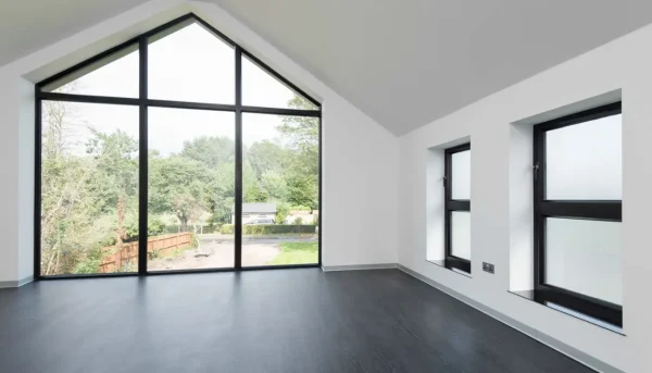 Origin aluminium gable window with black frames and large panes of glass.
